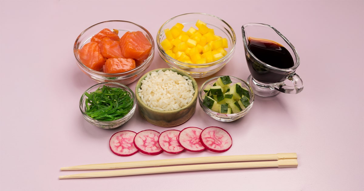 Premium Japanese ingredients like sushi rice, miso paste, and matcha tea on display at QKO Asian Market, a top Japanese grocery store in Dubai