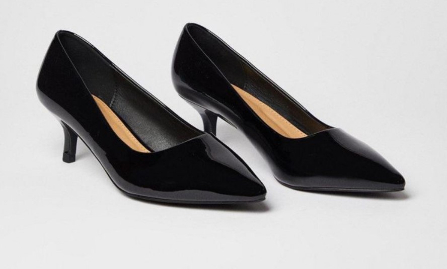 Classic black court shoes by Dorothy Perkins with a wide-fit cut and a subtle kitten heel, offering stylish comfort for work or evening wear.