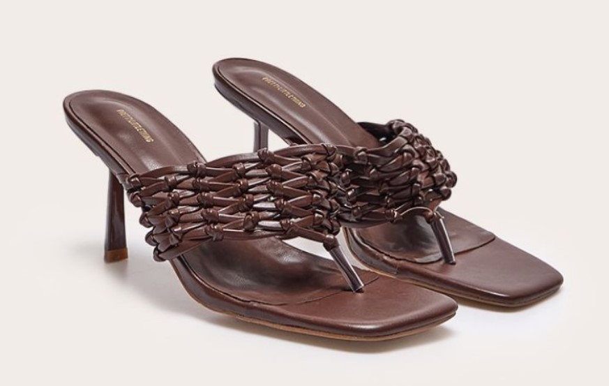 Brown PU mid‑heeled mules with a square toe and woven thong‑style strap.