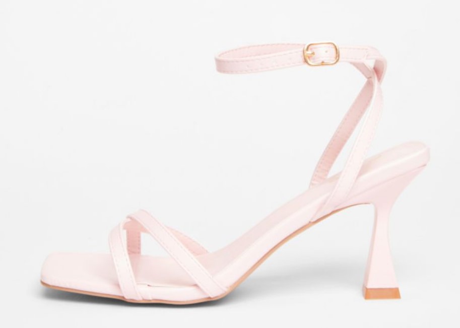 Light pink faux‑leather open‑toe heels with thin straps and an 8 cm flared heel.