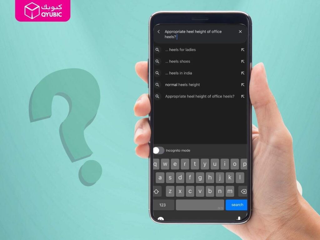 Hand holding smartphone displaying search for ‘Appropriate heel height of office heels?