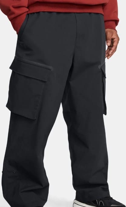 Under Armour Men's UA Unstoppable Cargo Utility Pants in white, featuring UA Storm technology and 4-way stretch ripstop fabric. Perfect for men looking for durable and water-repellent tactical cargo pants or streetwear cargo pants in Dubai