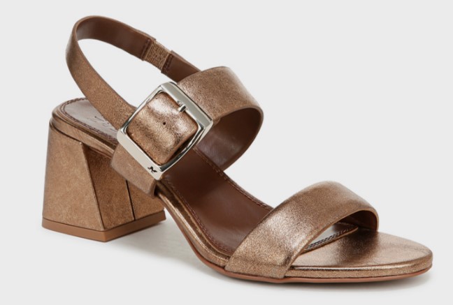 An image of a heeled sandal being covered with trending metallic color with a steady heel height .