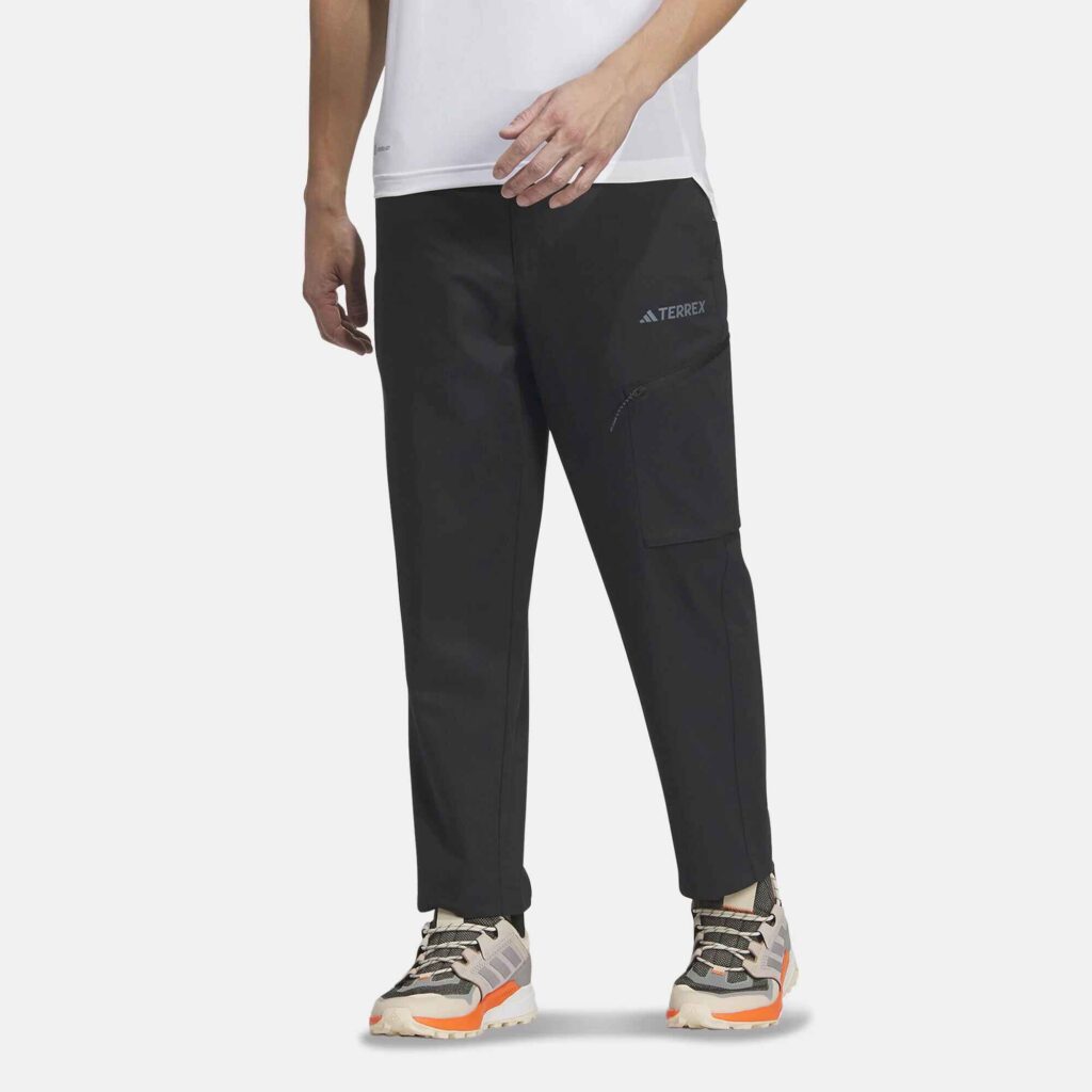Adidas Men's Terrex UPF50+ Cargo Pants in black, made with a breathable cotton blend and UPF 50+ sun protection. An excellent choice for men needing comfortable and protective cargo trousers for outdoor activities in Dubai.