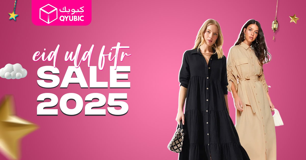 A promotional banner for Qyubic's Eid Ul-Fitr Sale 2025, featuring two models in elegant dresses against a pink background with decorative stars, lanterns, and clouds.