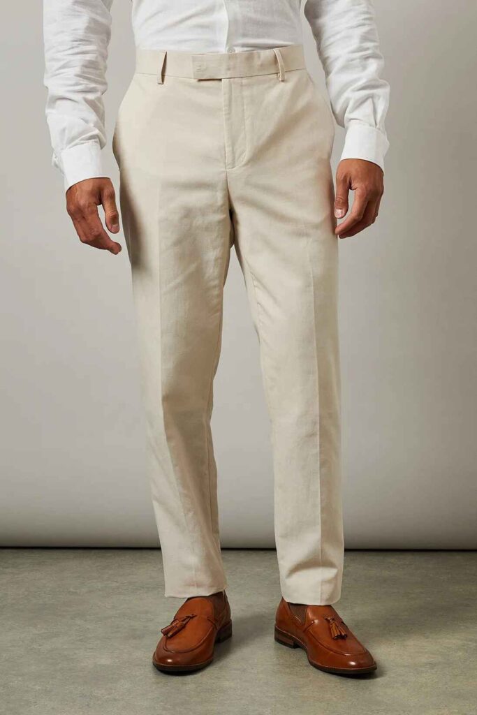 Burton Slim Fit Cotton-Linen Suit Trousers – Natural: A pair of light beige slim-fit cotton-linen Formal Trousers for Men, designed for breathability in hot climates like Dubai.