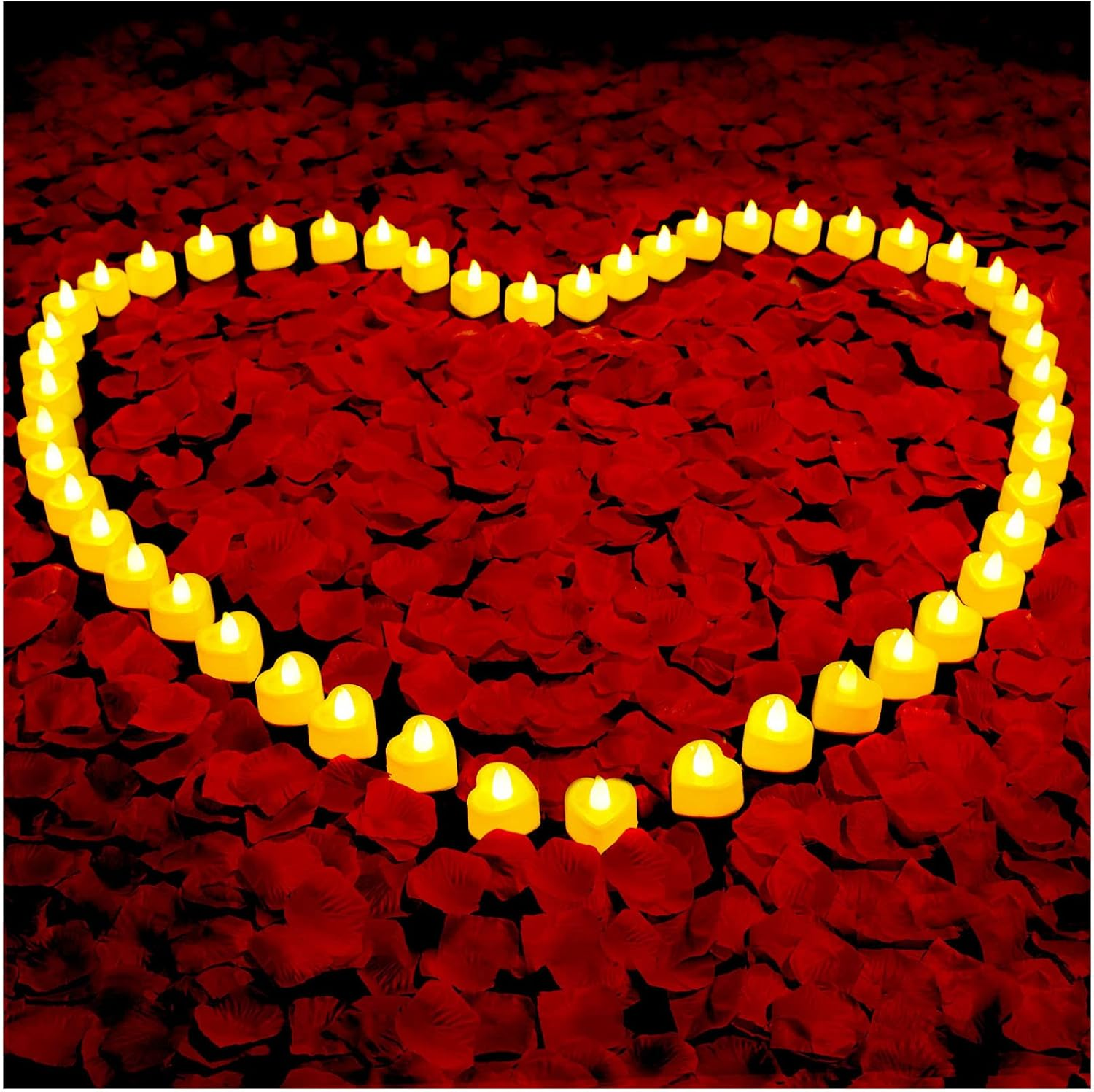 Romantic set of LED tealight candles arranged in a heart shape with red rose petals, ideal for setting the perfect Valentine’s Day mood