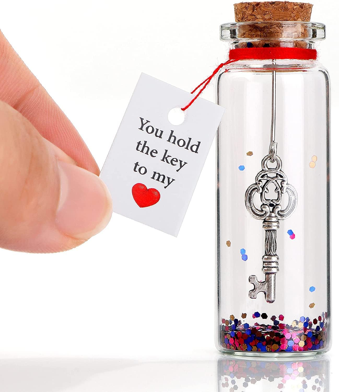 Romantic message in a bottle featuring a key charm and the tag 'You Hold the Key to My Heart,' a sweet and meaningful Valentine’s Day gift