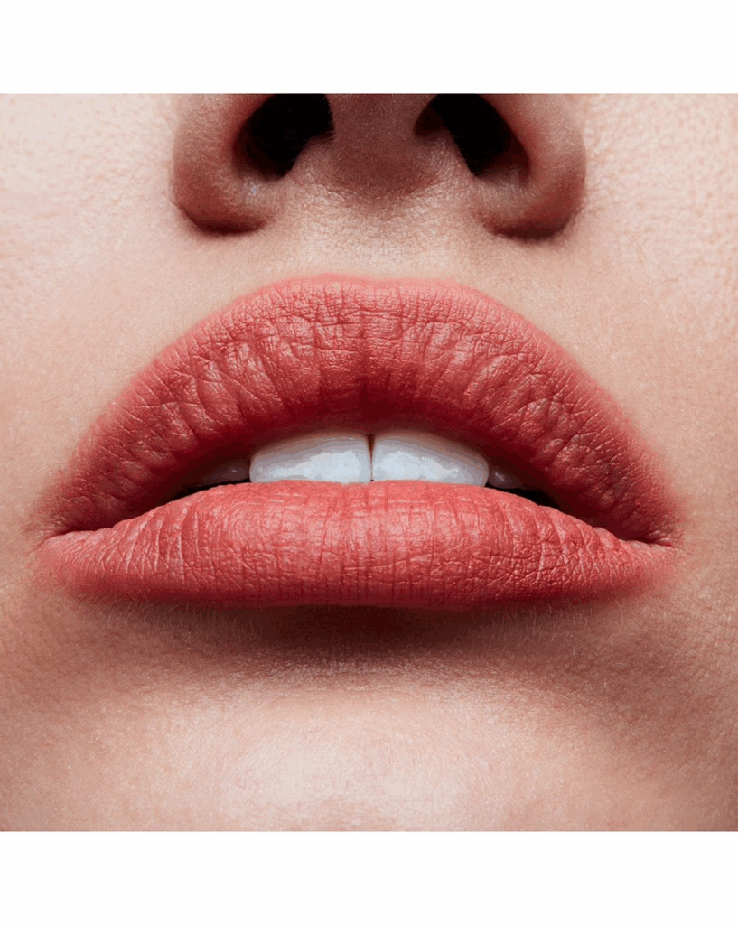 This soft peachy matte lipstick brings airy definition for medium and olive skin. A weightless velvet lipstick that flatters warm undertones while offering a light, kiss-proof lipstick feel.