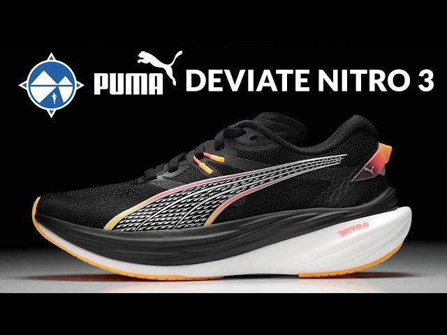 A promotional image of the Puma Deviate Nitro 3 running shoe in black with a white cushioned sole and orange outsole. The shoe features a sleek design with Puma's signature logo on the side. The text 'PUMA DEVIATE NITRO 3' is displayed in bold white letters at the top, alongside a blue and white logo.